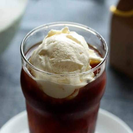 Coffee cup with a delicious scoop of gelato, creating a tempting blend of flavors