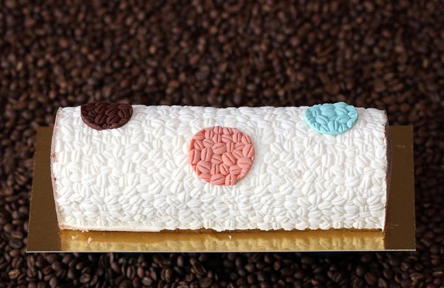 White coffee gelato, peanut chocolate semifreddo, sponge cake soaked with coffee liqueur.