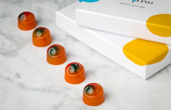 Botolino passion fruit bonbons — Valrhona white chocolate with passion fruit jelly, ganache, and almond praline