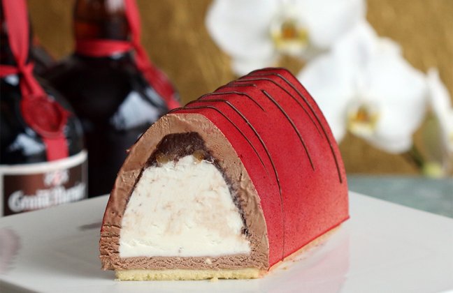 Hazelnut chocolate semifreddo, Grand Marnier gelato, candied Sicilian orange peel and a sponge cake.