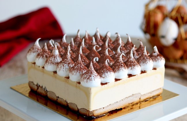Tiramisú semifreddo, lady fingers cookies soaked in espresso and rum.