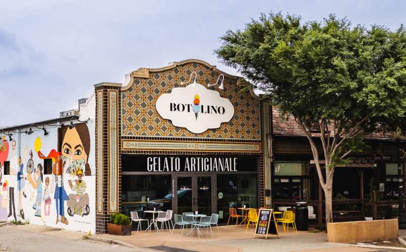 Botolino Gelato Artigianale storefront on Greenville Ave, Dallas — decorative tiled facade, street mural, and outdoor seating