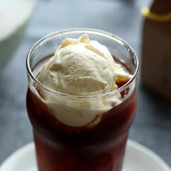 Coffee cup with a delicious scoop of gelato, creating a tempting blend of flavors