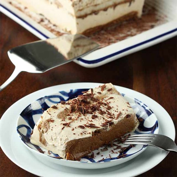 Classic Italian layered dessert with espresso-soaked ladyfingers and silky mascarpone cream, finished with a delicate dusting of cocoa